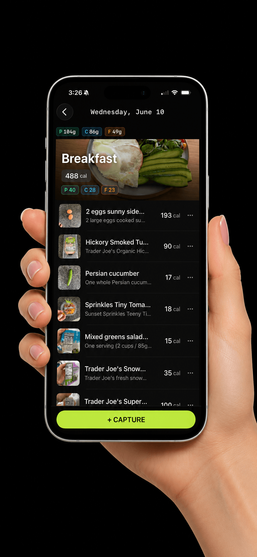 Kiwied day view - a full day of meals logged, each with calories.